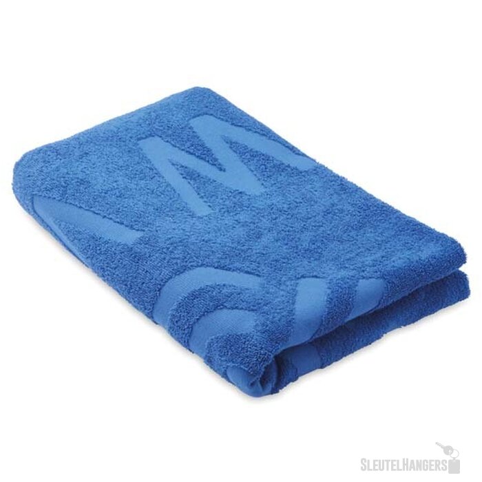 Geweven strandlaken met reliëf